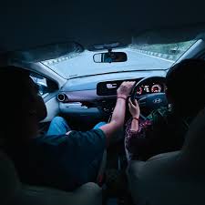 Rashi Motor Driving School instructor guiding a learner during an evening driving lesson